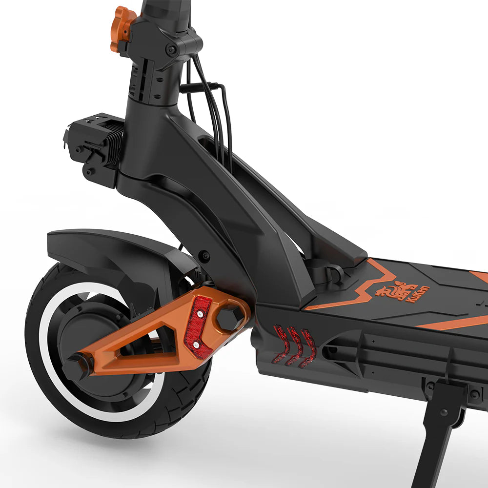 Close-up of the KuKirin G3 PRO 2x 1200Ws front wheel and frame. The design features bold lines, a sturdy suspension, and a top speed of 65 km/h. Vibrant orange accents add a sporty flair to the sleek black scooter.